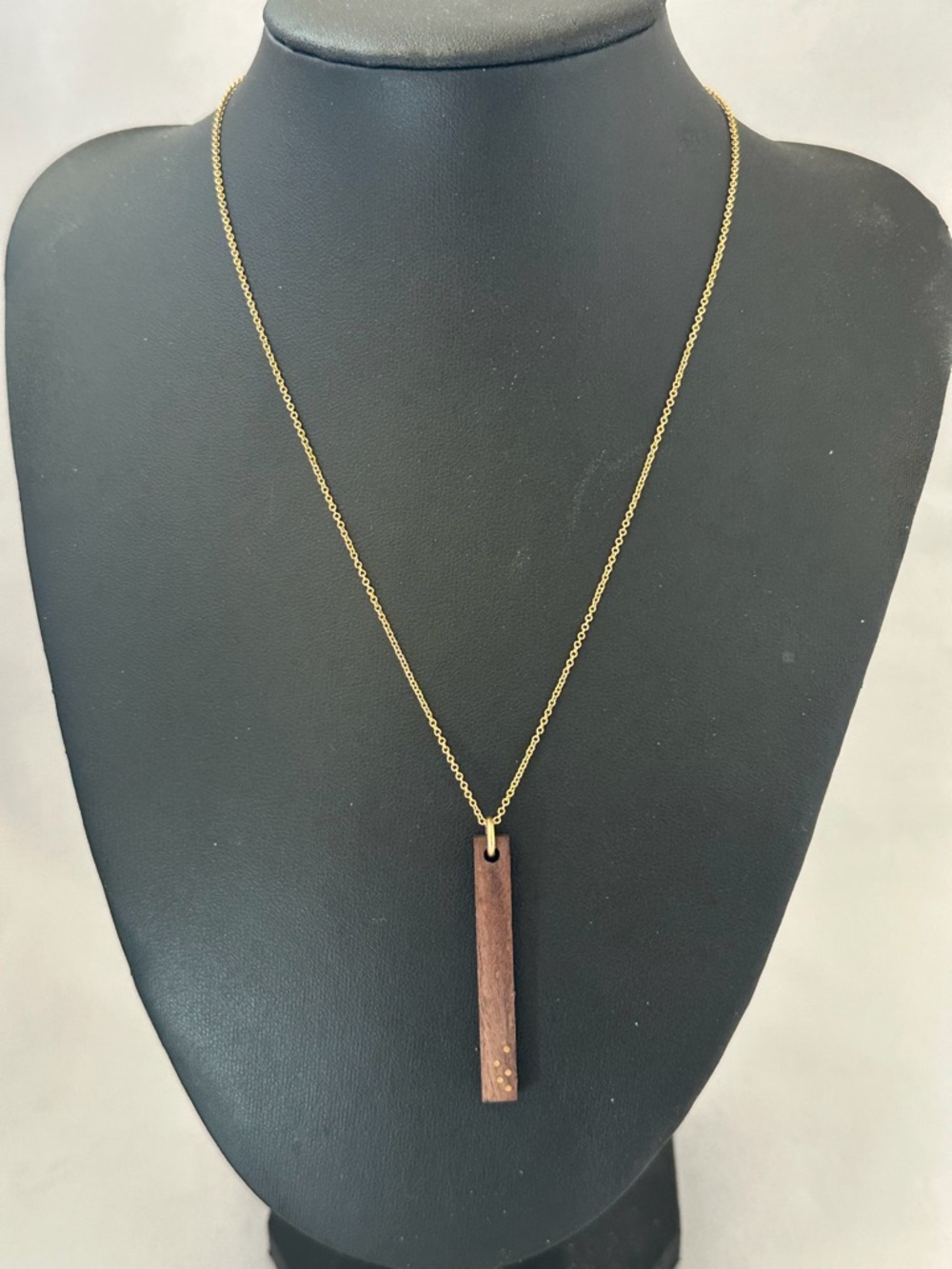 Liel and Lentz 5th Anniversary wooden pendant with 14kt gold dots